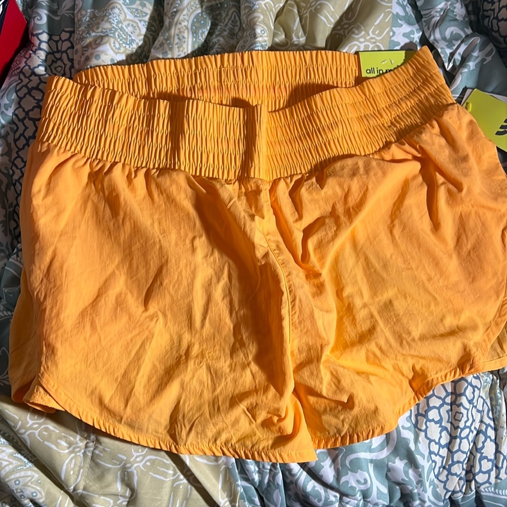 All in Motion Women's High Rise Crinkle Shorts Orange